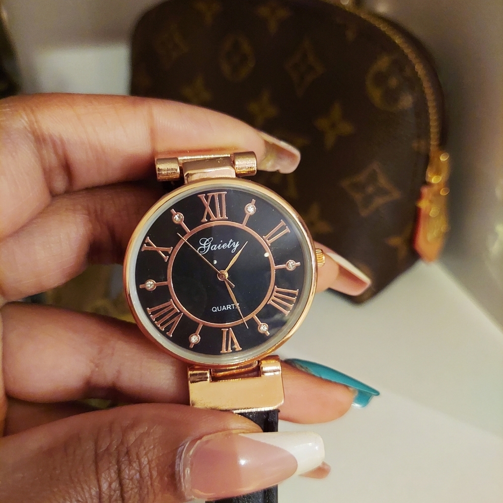 Black and rose gold watch